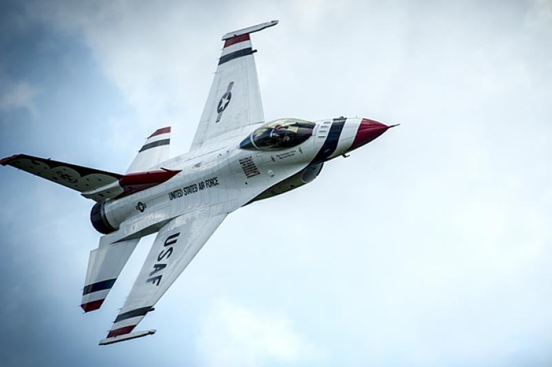 Thunderbird 6 performs the Sneak Pass maneuver during a practice show at Melbourne, Florida, Oct. 3, 2014. Photo credit U.S. Air Force.