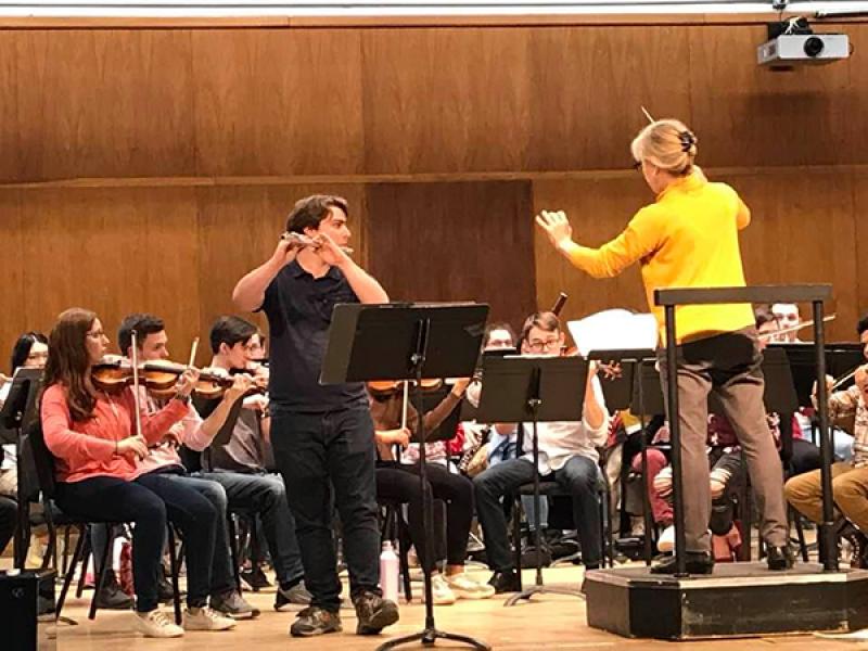 Daniel Zipin playing flute with the Ohio State Symphony Orchestra