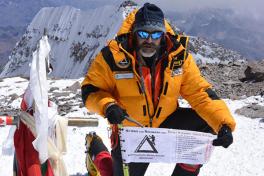 Mike Fairman atop a mountain