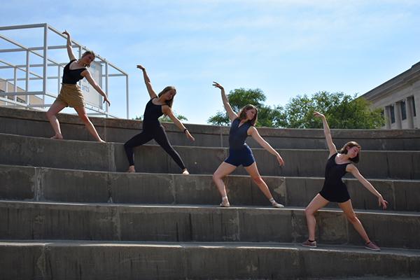 Ballet dancers posing on steps