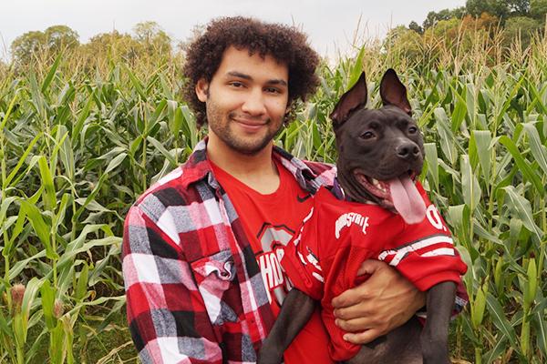 Evan Baugh and his dog, Hades