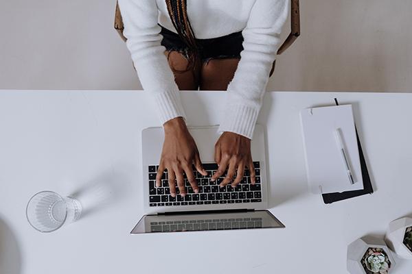 Woman at laptop stock image